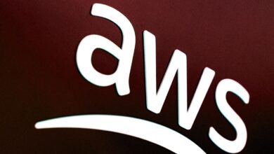The white AWS logo is displayed prominently against a dark red background.
