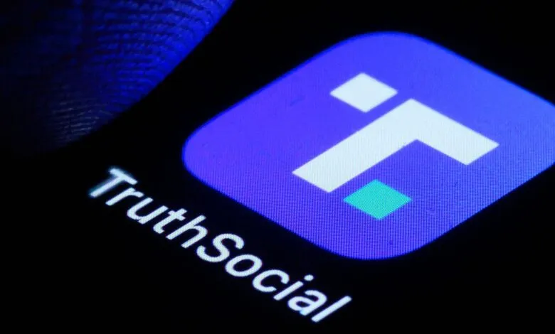 Close-up of the Truth Social app icon on a dark screen, with a finger visible.