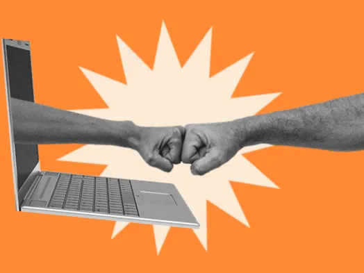 Two fists meet in a fist bump emerging from a laptop screen against an orange background.