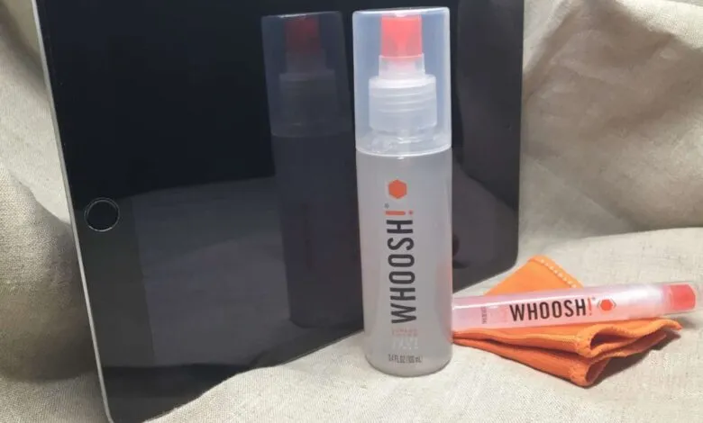 WHOOSH! screen cleaner bottle and pen next to a tablet screen.