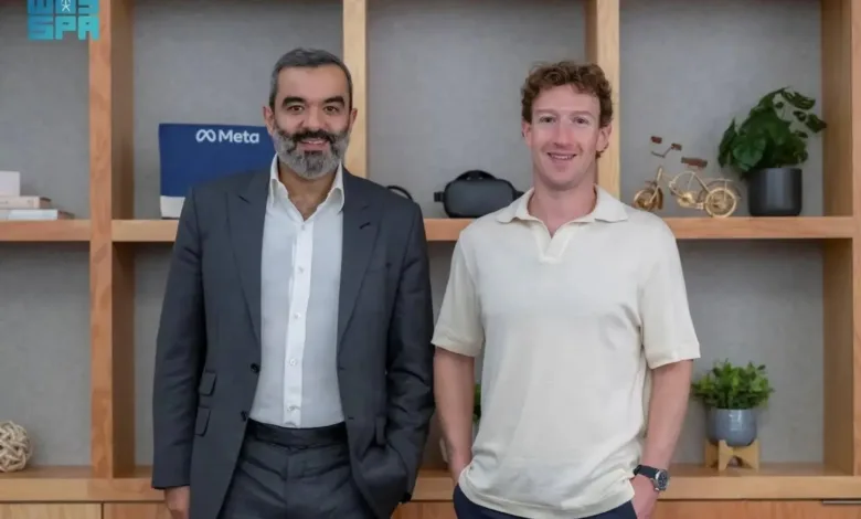 Mark Zuckerberg and Saudi Minister of Communications and Information Technology, Abdullah Al-Swaha, stand together.