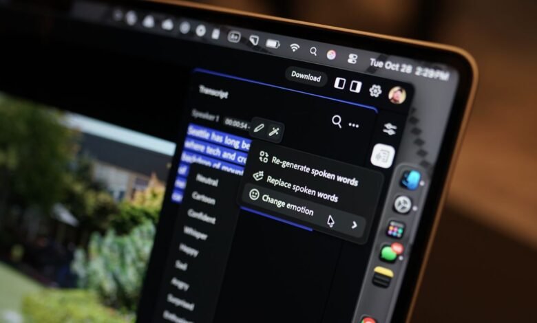 Close-up of a laptop screen showing audio editing software with transcript and emotion options.