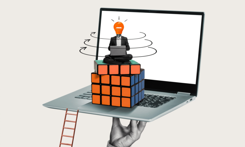 Surreal image of a person with a lightbulb head sitting on a Rubik's Cube on a laptop.