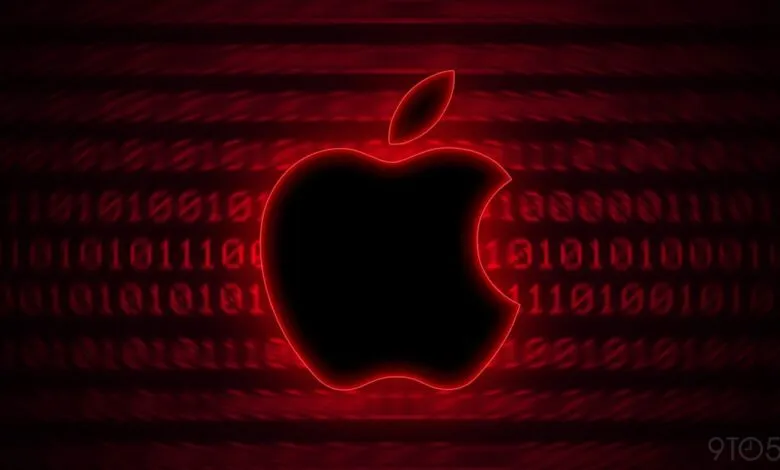The Apple logo is outlined in neon red against a dark background with red binary code.