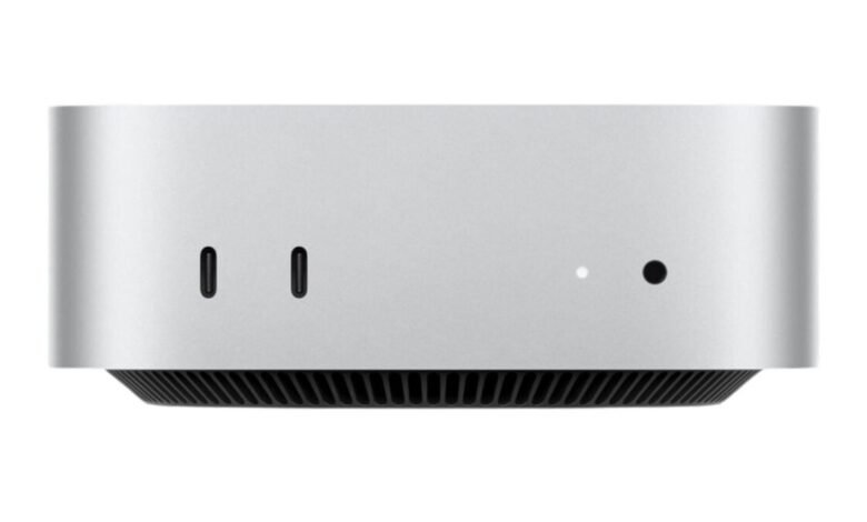 Close-up of the side of a silver Apple Mac Studio computer, showing two USB-C ports and indicator lights.