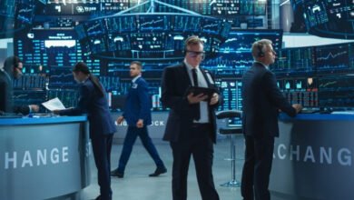 Traders in a modern stock exchange with multiple screens displaying financial data.