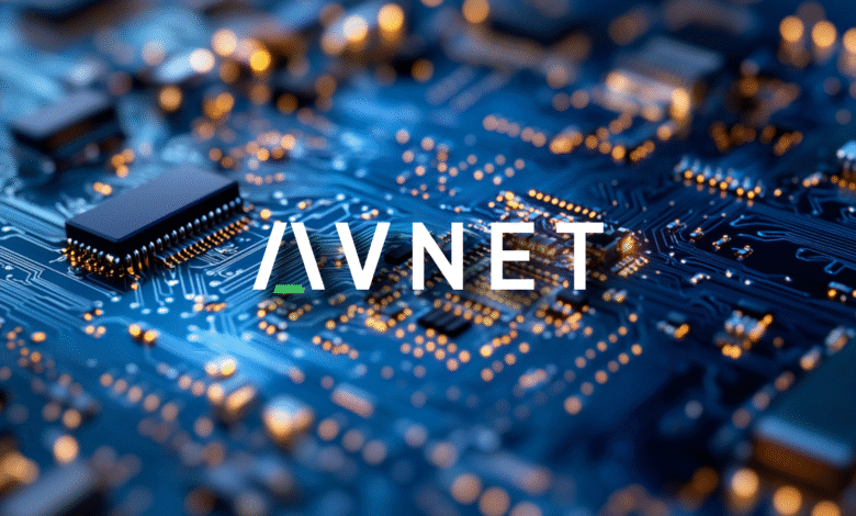Close-up of a complex circuit board with glowing orange lights and the AVNET logo.