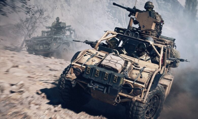 Soldiers in tactical gear ride in a desert buggy with mounted weapons, kicking up dust.