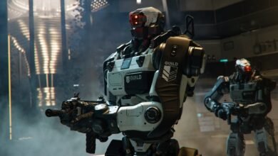 A futuristic combat robot with glowing red eyes holding a rifle.