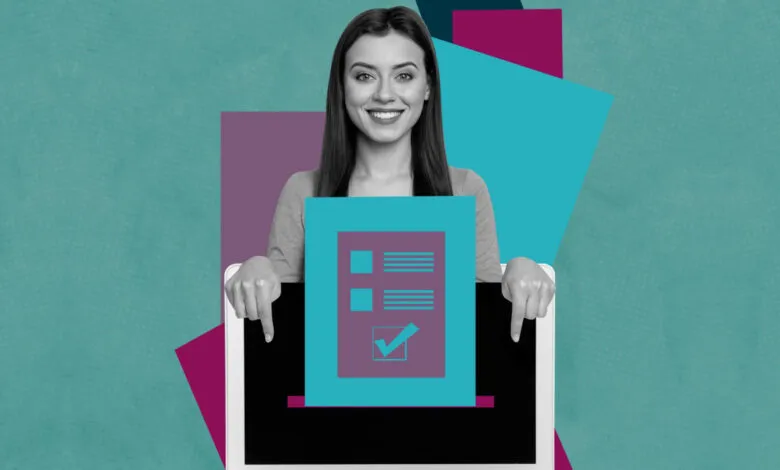 Woman smiling and holding a tablet displaying a checklist with a checkmark.