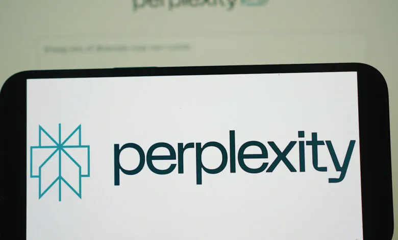 Close-up of a smartphone screen displaying the Perplexity AI logo and website.