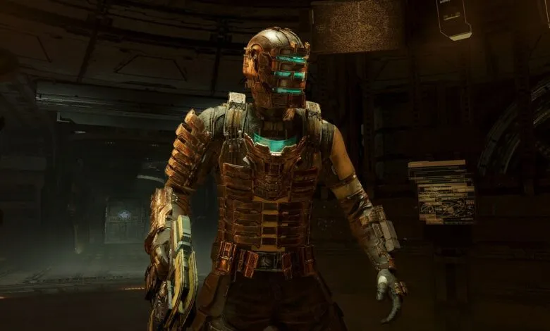 Isaac Clarke in his iconic RIG suit from Dead Space, standing in a dimly lit spaceship corridor.