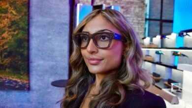 Woman wearing smart glasses with Ray-Ban logo