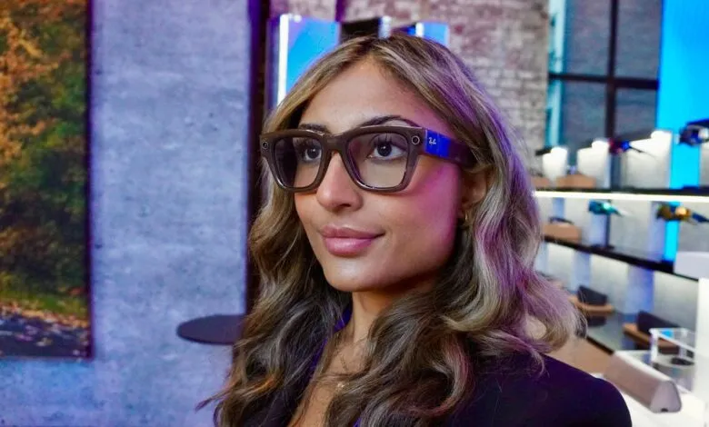Woman wearing smart glasses with Ray-Ban logo