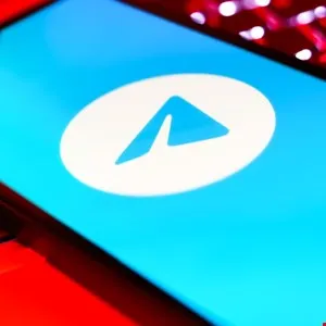 Close-up of the Telegram app logo on a smartphone screen.