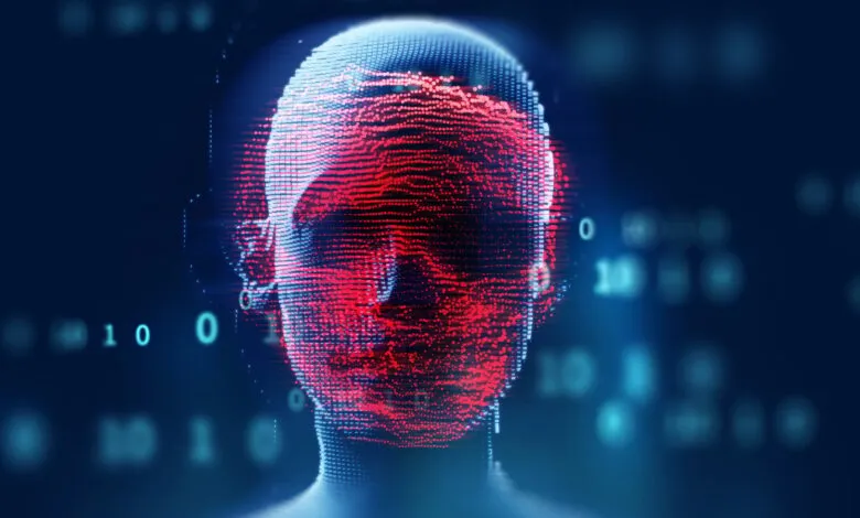 Digital rendering of a human head made of red and blue dots, with binary code in the background.
