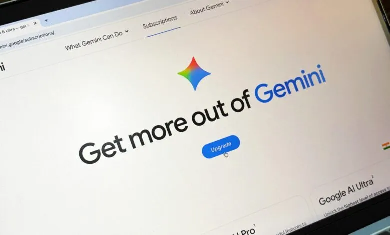 Close-up of a laptop screen showing the Gemini AI subscription page with an 'Upgrade' button.