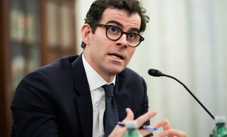 Adam Mosseri, Head of Instagram, speaks at a hearing with a microphone in front of him.