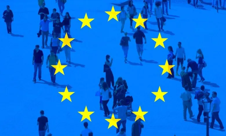 People walking across a blue background with yellow European Union stars.