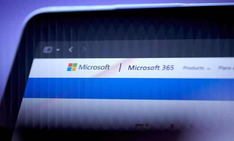 Close-up of a laptop screen displaying the Microsoft 365 website.