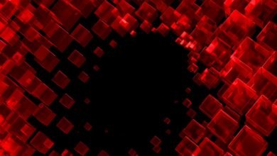 Abstract background of translucent red cubes against a black void.