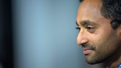 Close-up profile of Chamath Palihapitiya, a man with dark hair and stubble.