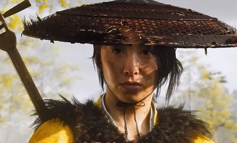 Close-up of a determined woman in traditional Japanese attire and a conical hat.