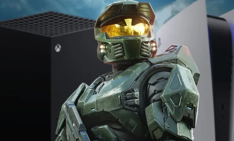 Master Chief from Halo stands between an Xbox Series X and a PlayStation 5 console.