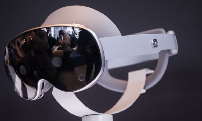Close-up of a white virtual reality headset with a reflective visor.