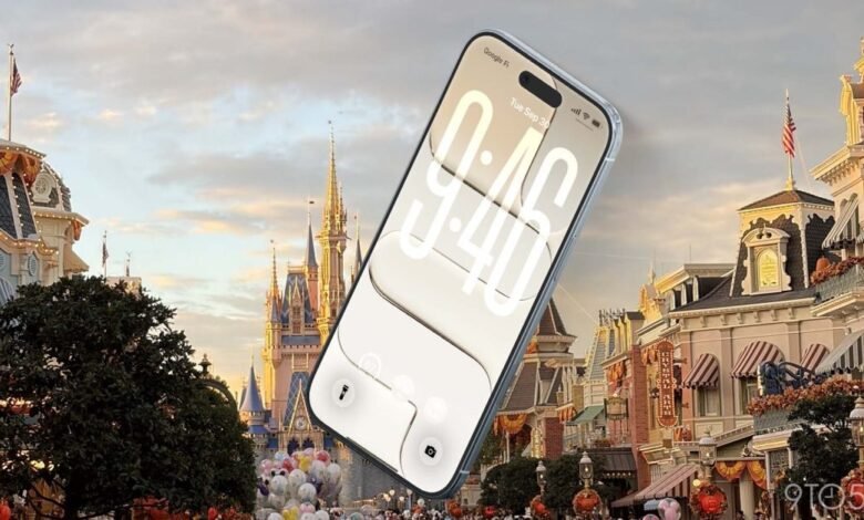 iPhone displaying lock screen with Disney castle and Main Street in background