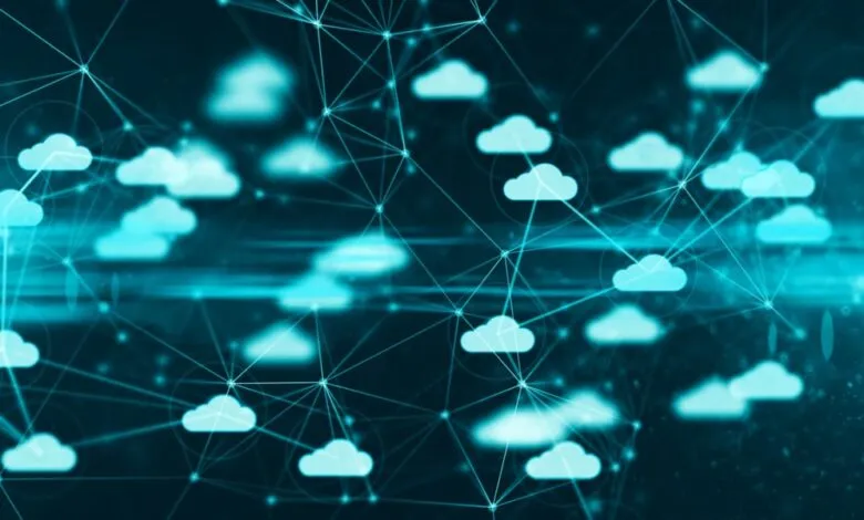 Abstract network of glowing blue clouds connected by lines and nodes.