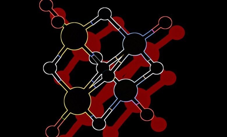 Abstract molecular structure with interconnected nodes and lines in various colors against a black background.