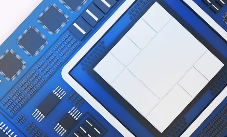 Close-up of a blue circuit board with intricate patterns and square chips.