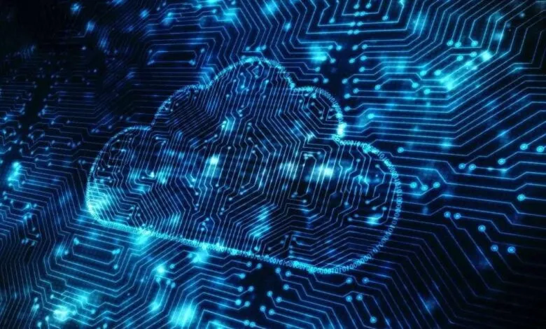 A glowing blue cloud symbol formed by circuit board lines and binary code.