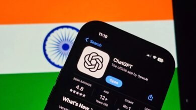 Smartphone displaying the ChatGPT app interface against the backdrop of the Indian flag.