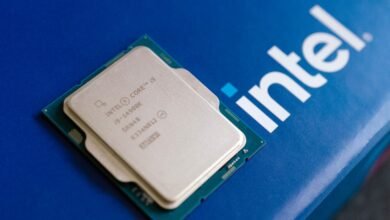 Intel Core i9-14900K processor on a blue Intel branded surface.
