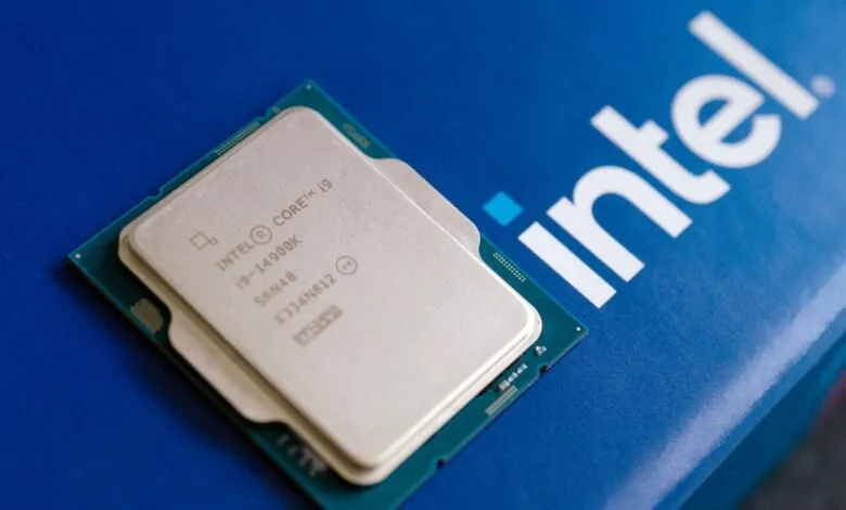 Intel Core i9-14900K processor on a blue Intel branded surface.