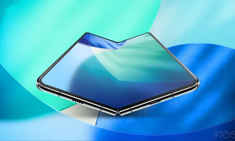 A folded smartphone with a sleek design, displaying a gradient of blue and green colors.