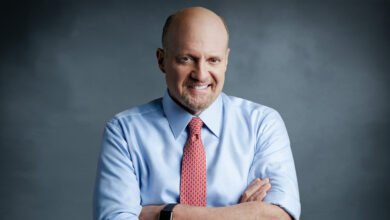 Jim Cramer, host of Mad Money, smiles with arms crossed.