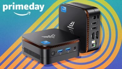 Two black Intel NUC mini PCs with orange accents against a blue and yellow abstract background.