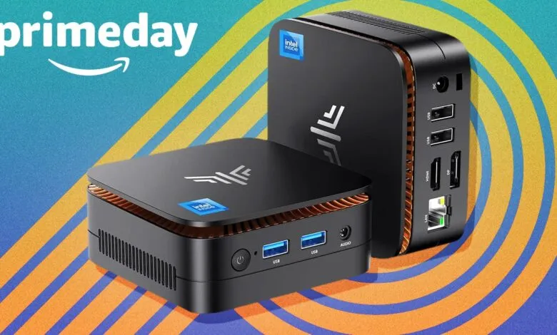 Two black Intel NUC mini PCs with orange accents against a blue and yellow abstract background.