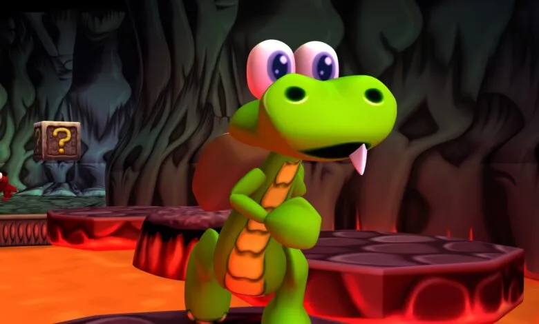 A cartoon green crocodile character with large purple eyes stands in a volcanic environment.