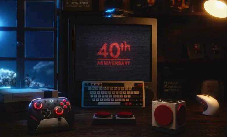 Retro gaming setup with vintage computer, controller, and Nintendo console.