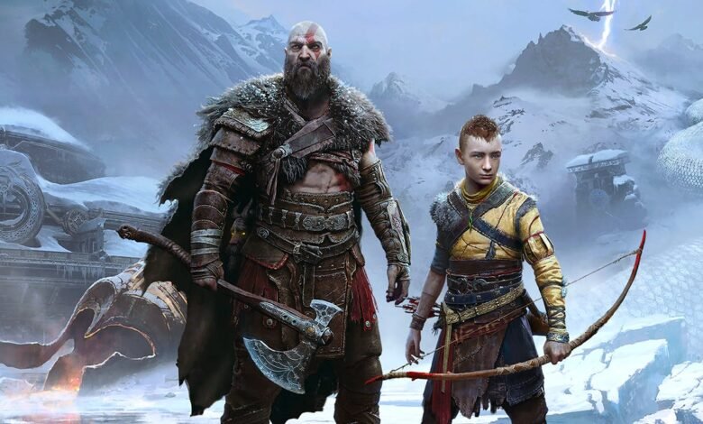 Kratos and Atreus stand in a snowy, mountainous landscape with a giant serpent in the background.