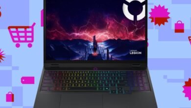 Lenovo Legion gaming laptop with vibrant RGB keyboard and futuristic wallpaper.