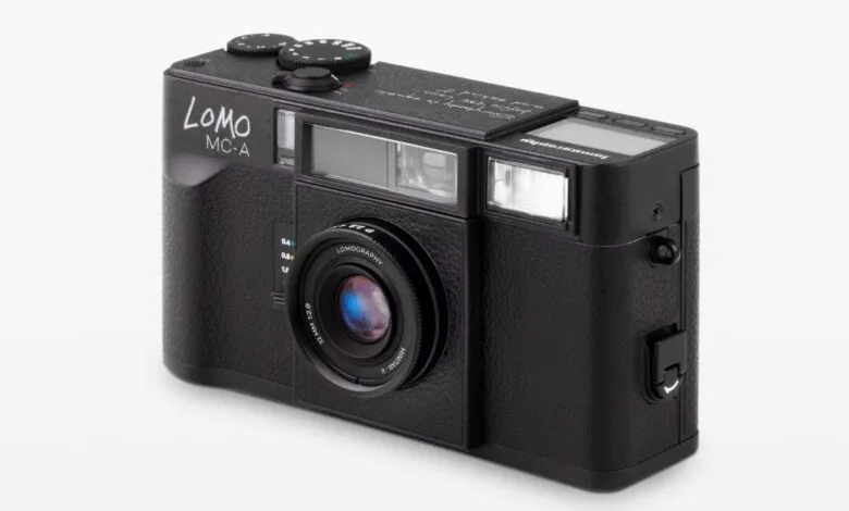 Close-up of a black Lomography LC-A camera with a silver lens.