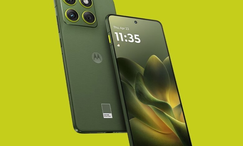 Two Motorola smartphones in a textured olive green finish against a bright yellow background.