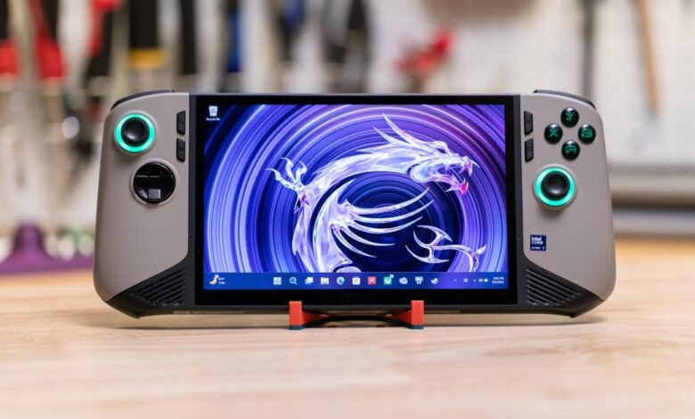 MSI Claw handheld gaming PC with a dragon wallpaper on screen.