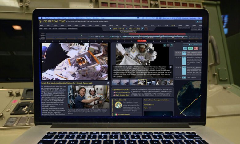 Laptop screen displaying ISS in Real Time software with astronaut images and mission data.