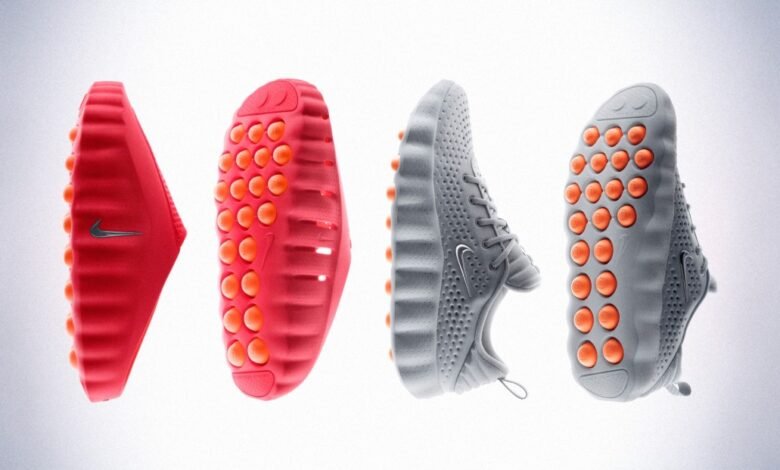Two pairs of Nike shoes, one red and one grey, displayed side-by-side against a white background.